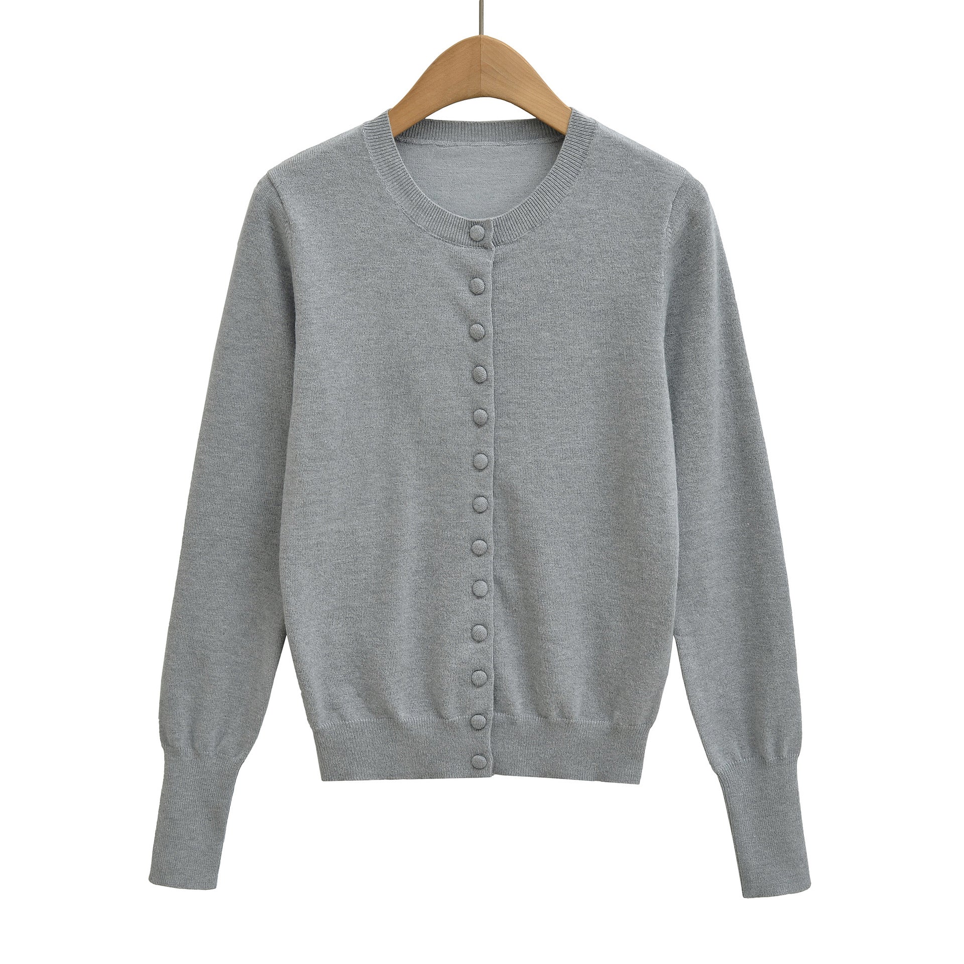 Round neck long sleeved single breasted loose top